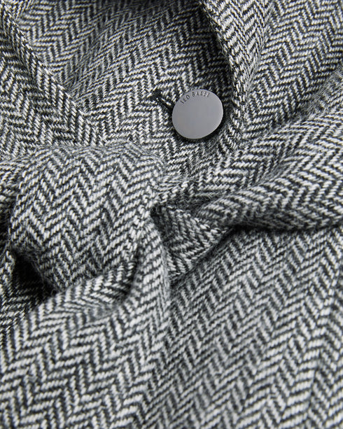 ROSEANE-Outerwear-Wrap yourself in elegance and warmth with the exquisite ROSEANE. Made from 100% wool with a herringbone texture, this coat exudes timeless style. Metal edge details refine the look for everyday wear. Wrap coat 100% wool Belted waist Button fastening Metal hardware tipping Pockets Herringbone texture Midi length- Ted Baker Romania